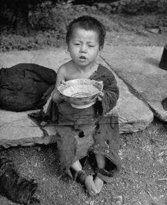 Chinese boy begs for food, 1946